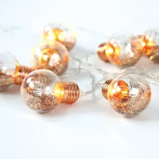 ΔΙΑΚΟΣΜΗΤΙΚΑ ΛΑΜΠΑΚΙΑ ΧΑΛΚΙΝΑ ΓΥΑΛΙΝΑ 10 LED ΣΕ ΣΕΙΡΑ ΘΕΡΜΟ ΛΕΥΚΟ ΜΠΑΤΑΡΙΕΣ 2xΑΑ ΜΕ ΚΑΛΩΔΙΟ ΔΙΑΦΑΝΟ 300mm IP20 1350mm